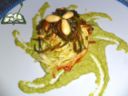 Nidi al pesto di zucchine gratinati con provola affumicata