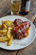 Costine di maiale alla texana (al forno) con patate al chili e salsa barbecue