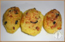 Barchette di patate con crema di carciofi ed olive nere