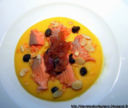 Trota salmonata in saor con polenta e mandorle