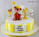Torta Orsetto con corocina in bianco e giallo per il 1° compleanno di un bimbo