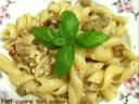 Pasta con melanzane, pomodori secchi e fiocchi di latte