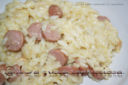 Risotto filante con scamorza e wurstel
