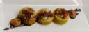 Crostini di polenta con salsiccia con riduzione di barolo