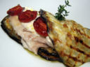 Parmigiana di melanzane e pesce
