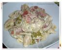 Conchiglie di kamut con speck, piselli e panna
