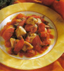 Fricassea di coniglio con pomodori e aneto