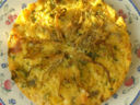 Tortino di riso con zucchine, fiori e asiago