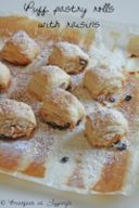 Girelle di pasta sfoglia con uvetta / Puff pastry rolls with raisins