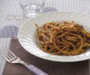 Pici con sugo di peperoni verdi e rucola