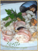 Risotto con totani, frutti di mare e friggitelli