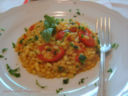 Orzotto con pomodorini e curry alle erbe fresche