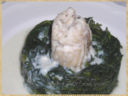 Rotolo di merluzzo su nido di agretti
