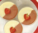 Crema bicolore al cucchiaio, con il rhum.