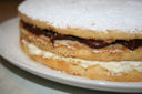 Torta con crema all'arancia e nocciolata