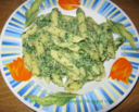 Penne con spinaci cremosi e pancetta