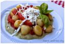 Gnocchi di patate con crema di melanzane, pomodorini e ricotta salata