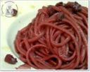 Spaghetti al vino con aglio e pancetta