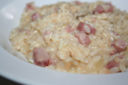 Risotto con fontina prosciutto e crema di funghi