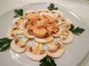 FILETTO DI SALMONE SU CARPACCIO DI FUNGHI CHAMPIGNON