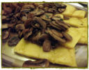 Spezzatino di vitella con funghi e polenta