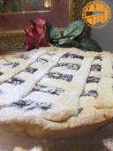 Crostata di lamponi e mandorle e ravioli dolci