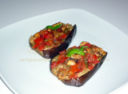 Melanzane con dadolata di pomodori in carta fata
