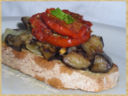 Crostoni con melanzane e pomodori (sfiziosi) al forno