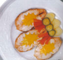 Scaloppe di salmone con salsa allo zafferano.