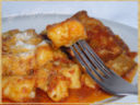 Gnocchi di patate con le spuntature di maiale