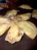 Mezzelune ripiene di porro e patate al sugo di vongoline