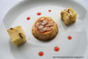 Crème  caramel all’arancia e mandorle con cubi di panettone cedro-cioccolato