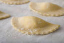 Ravioli con prosciutto e carciofi