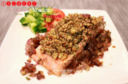 Filetto di salmone in crosta di nocciole e mandorle
