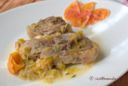 Agnello in coccio con arancia e porri