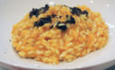 Risotto alla zucca con perle di tartufo nero.