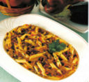 Penne con melanzana e salsiccia.