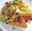 Triangoli di polenta alle erbe.