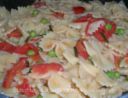 Farfalle pomodoro e piselli con erba cipollina