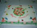 Torta auguri decorata con fiori