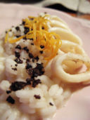 pompelmo rosa, calamari e polvere di taggiasche