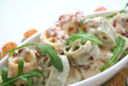 Primi piatti facili: pasta con rucola, panna e prosciutto