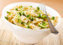 Le farfalle con piselli e zucchine al curry