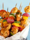 Ricette antipasti di pesce: Spiedini di gamberi piccanti