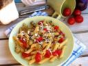 Pasta con melanzane, pomodorini e ricotta al forno