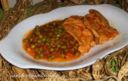 Petto di pollo con piselli e speck