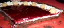 Crostata al cacao con crema di limoncello e sciroppo di lamponi