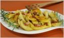 La ricetta delle patate al forno con la pancetta