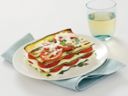 Parmigiana di pasta, zucchine e pomodori