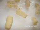 Gnocchi con sugo di salsiccia e rucola